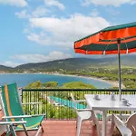 Апартаменты Terrazza Sulla Baia Марина-ди-Кампо